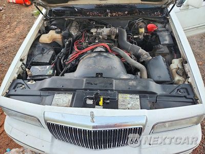 Zdjęcie 11 z 12 samochodu: 1997 LINCOLN TOWN CAR SIGNATURE VIN:1LNLM82W5VY742450 - miniatura