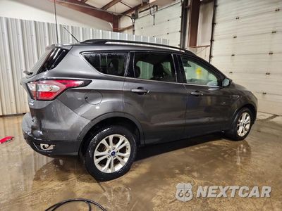 Trzecie zdjęcie samochodu z tyłu: 2018 FORD ESCAPE SE VIN:1FMCU0GD2JUD06438 - miniatura