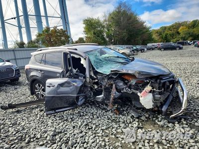 Czwarte zdjęcie samochodu z boku: 2017 TOYOTA RAV4 LE VIN:JTMBFREV6HJ703754 - miniatura
