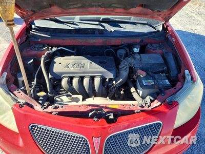 Zdjęcie 12 z 13 samochodu: 2005 PONTIAC VIBE VIN:5Y2SM63875Z473866 - miniatura