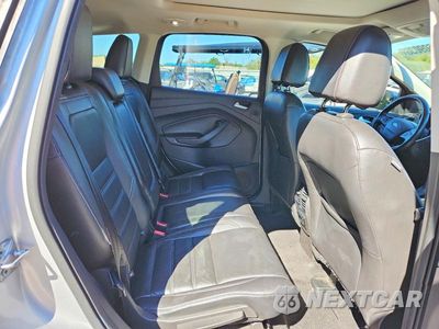 Zdjęcie 10 z 13 samochodu: 2017 FORD ESCAPE TITANIUM VIN:1FMCU9J98HUD90574 - miniatura