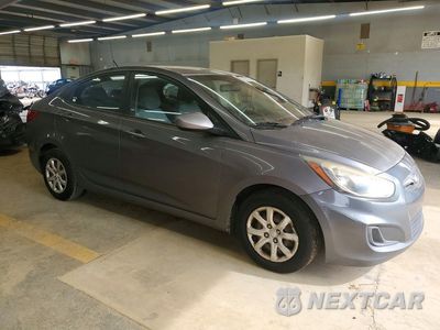 Czwarte zdjęcie samochodu z boku: 2014 HYUNDAI ACCENT GLS VIN:KMHCT4AE2EU638803 - miniatura