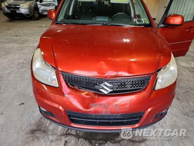 Zdjęcie 11 z 12 samochodu: 2011 SUZUKI SX4 VIN:JS2YB5A39B6301777 - miniatura