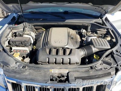 Zdjęcie 12 z 13 samochodu: 2012 JEEP GRAND CHEROKEE LAREDO VIN:1C4RJFAT8CC218481 - miniatura