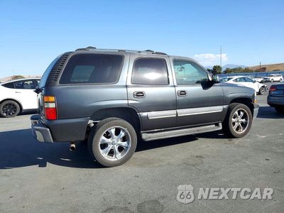 Trzecie zdjęcie samochodu z tyłu: 2004 CHEVROLET TAHOE C1500 VIN:1GNEC13V14R121798 - miniatura