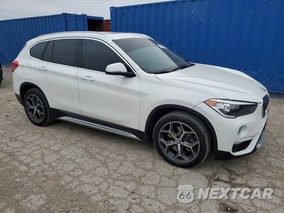 Czwarte zdjęcie samochodu z boku: 2018 BMW X1 XDRIVE28I VIN:WBXHT3C32J5L31378 - miniatura