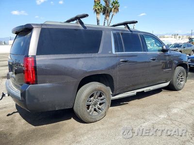 Trzecie zdjęcie samochodu z tyłu: 2017 CHEVROLET SUBURBAN C1500 LT VIN:1GNSCHKC3HR153623 - miniatura