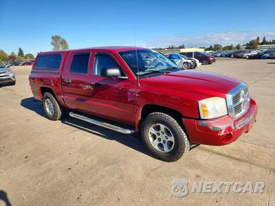 Czwarte zdjęcie samochodu z boku: 2007 DODGE DAKOTA QUAD SLT VIN:1D7HW48PX7S202620 - miniatura