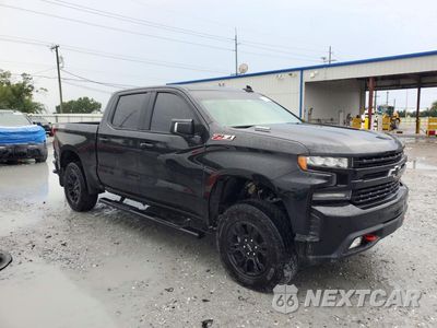 Czwarte zdjęcie samochodu z boku: 2022 CHEVROLET SILVERADO LTD K1500 LT TRAIL BOSS VIN:3GCUYFET3NG199600 - miniatura