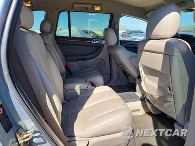Zdjęcie 11 z 13 samochodu: 2004 CHRYSLER PACIFICA VIN:2C8GM68444R615111 - miniatura