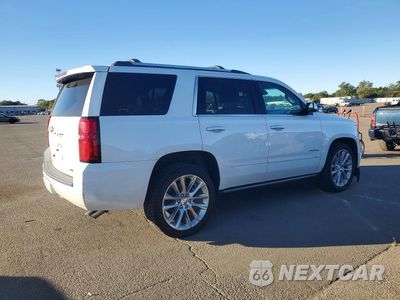 Trzecie zdjęcie samochodu z tyłu: 2019 CHEVROLET TAHOE K1500 PREMIER VIN:1GNSKCKJ6KR211462 - miniatura