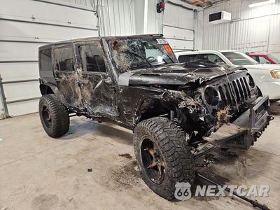 Czwarte zdjęcie samochodu z boku: 2010 JEEP WRANGLER UNLIMITED SAHARA VIN:1J4BA5H11AL147633 - miniatura