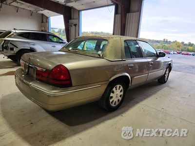 Trzecie zdjęcie samochodu z tyłu: 2003 MERCURY GRAND MARQUIS VIN:2MEHM75W93X673886 - miniatura
