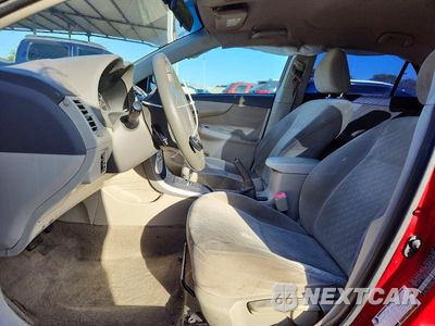 Zdjęcie 7 z 12 samochodu: 2009 TOYOTA COROLLA LE VIN:JTDBL40EX99080385 - miniatura