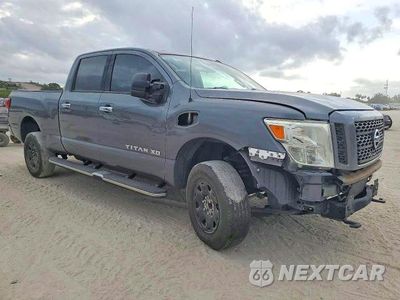 Czwarte zdjęcie samochodu z boku: 2016 NISSAN TITAN XD SV VIN:1N6BA1F14GN517646 - miniatura