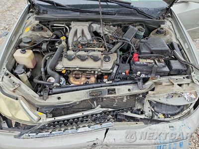 Zdjęcie 11 z 12 samochodu: 2003 TOYOTA AVALON XLS VIN:4T1BF28B83U278453 - miniatura