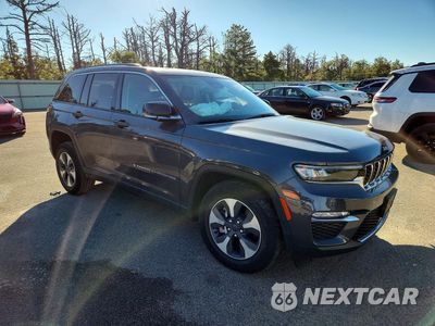 Czwarte zdjęcie samochodu z boku: 2022 JEEP GRAND CHEROKEE LIMITED 4XE VIN:1C4RJYB6XN8717390 - miniatura