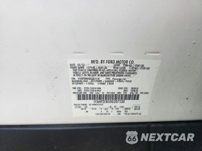 Zdjęcie 12 z 12 samochodu: 2013 FORD TAURUS SEL VIN:1FAHP2E85DG207530 - miniatura