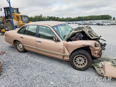 Czwarte zdjęcie samochodu z boku: 1996 FORD CROWN VICTORIA LX VIN:2FALP74W4TX124722 - miniatura