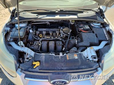 Zdjęcie 11 z 12 samochodu: 2014 FORD FOCUS TITANIUM VIN:1FADP3J27EL463277 - miniatura