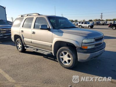 Czwarte zdjęcie samochodu z boku: 2002 CHEVROLET TAHOE K1500 VIN:1GNEK13Z42R167712 - miniatura