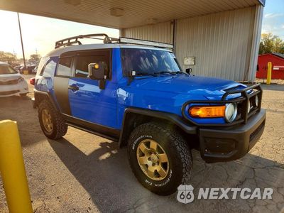 Czwarte zdjęcie samochodu z boku: 2007 TOYOTA FJ CRUISER BASE VIN:JTEBU11F770007216 - miniatura