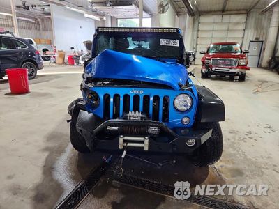 Piąte zdjęcie samochodu w środku: 2015 JEEP WRANGLER UNLIMITED SPORT VIN:1C4HJWDG8FL707798 - miniatura