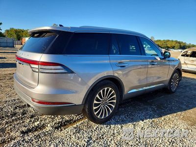 Trzecie zdjęcie samochodu z tyłu: 2021 LINCOLN AVIATOR RESERVE VIN:5LM5J7WC0MGL19109 - miniatura
