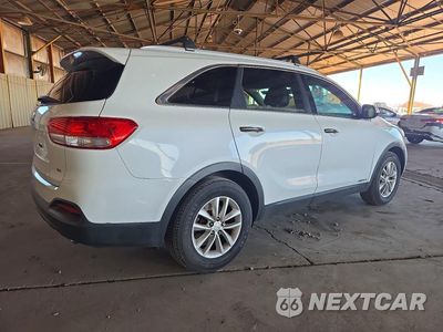 Trzecie zdjęcie samochodu z tyłu: 2016 KIA SORENTO LX V6 VIN:5XYPGDA5XGG132019 - miniatura