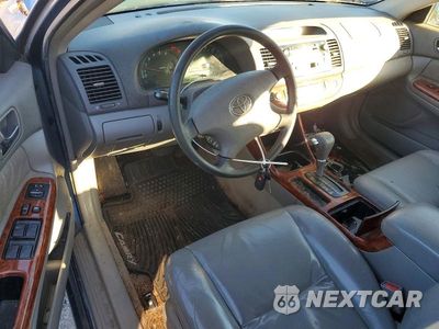 Zdjęcie 8 z 12 samochodu: 2003 TOYOTA CAMRY XLE VIN:JTDBE30K030176869 - miniatura