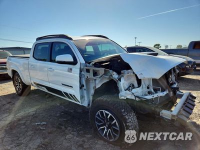 Czwarte zdjęcie samochodu z boku: 2021 TOYOTA TACOMA TRD SPORT VIN:3TMDZ5BN7MM111306 - miniatura