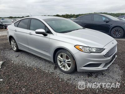 Czwarte zdjęcie samochodu z boku: 2018 FORD FUSION SE HYBRID VIN:3FA6P0LU2JR173417 - miniatura