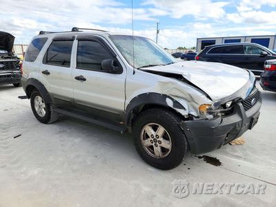 Czwarte zdjęcie samochodu z boku: 2005 FORD ESCAPE XLS VIN:1FMYU02Z55KD99742 - miniatura