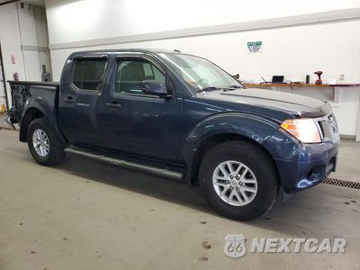Czwarte zdjęcie samochodu z boku: 2016 NISSAN FRONTIER SV VIN:1N6AD0EV8GN738281 - miniatura