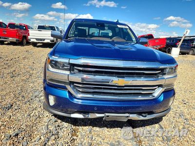 Piąte zdjęcie samochodu w środku: 2017 CHEVROLET SILVERADO K1500 HIGH COUNTRY VIN:3GCUKTEC6HG443857 - miniatura