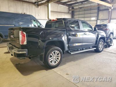 Trzecie zdjęcie samochodu z tyłu: 2016 GMC CANYON SLT VIN:1GTG5DE33G1315051 - miniatura