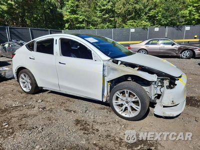 Czwarte zdjęcie samochodu z boku: 2022 TESLA MODEL Y VIN:7SAYGDEE0NF374968 - miniatura