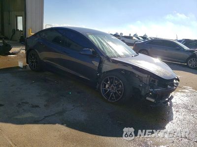 Czwarte zdjęcie samochodu z boku: 2023 TESLA MODEL 3 VIN:5YJ3E1EB2PF682034 - miniatura
