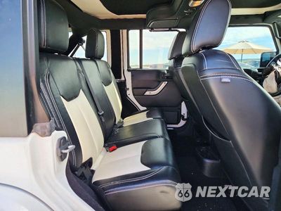 Zdjęcie 11 z 13 samochodu: 2017 JEEP WRANGLER UNLIMITED SAHARA VIN:1C4HJWEG3HL624863 - miniatura
