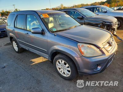 Czwarte zdjęcie samochodu z boku: 2006 HONDA CR-V SE VIN:SHSRD78976U440114 - miniatura