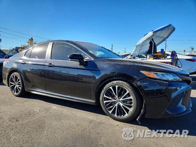 Czwarte zdjęcie samochodu z boku: 2018 TOYOTA CAMRY HYBRID SE VIN:4T1B21HK9JU504194 - miniatura