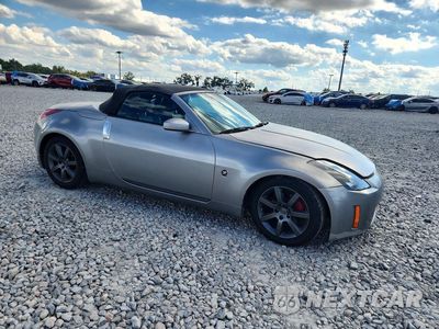 Czwarte zdjęcie samochodu z boku: 2005 NISSAN 350Z ENTHUSIAST VIN:JN1AZ36A55M754302 - miniatura