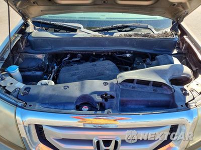 Zdjęcie 12 z 13 samochodu: 2011 HONDA PILOT LX VIN:5FNYF4H24BB103165 - miniatura