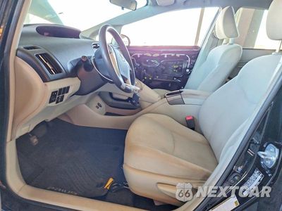 Zdjęcie 7 z 13 samochodu: 2013 TOYOTA PRIUS TWO VIN:JTDKN3DU2D5621693 - miniatura
