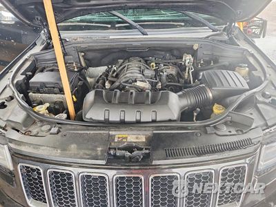Zdjęcie 12 z 13 samochodu: 2014 JEEP GRAND CHEROKEE OVERLAND VIN:1C4RJECT9EC256019 - miniatura