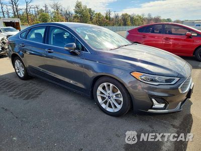 Czwarte zdjęcie samochodu z boku: 2020 FORD FUSION TITANIUM VIN:3FA6P0SU0LR142431 - miniatura