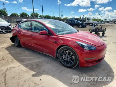 Czwarte zdjęcie samochodu z boku: 2023 TESLA MODEL 3 VIN:5YJ3E1EA2PF447866 - miniatura