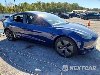 Czwarte zdjęcie samochodu z boku: 2022 TESLA MODEL 3 VIN:5YJ3E1EA2NF168253 - miniatura