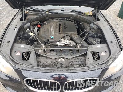 Zdjęcie 11 z 12 samochodu: 2014 BMW 740 LI VIN:WBAYE4C55ED138021 - miniatura