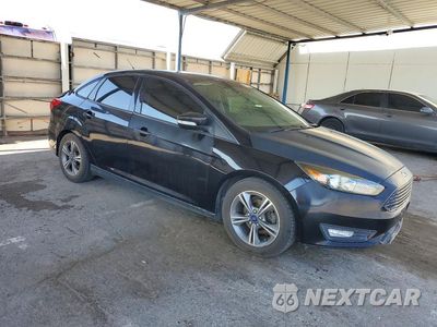 Czwarte zdjęcie samochodu z boku: 2016 FORD FOCUS SE VIN:1FADP3FE3GL200127 - miniatura